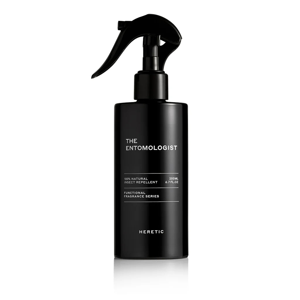 A product image featuring a black spray bottle labeled 'The Entomologist'.