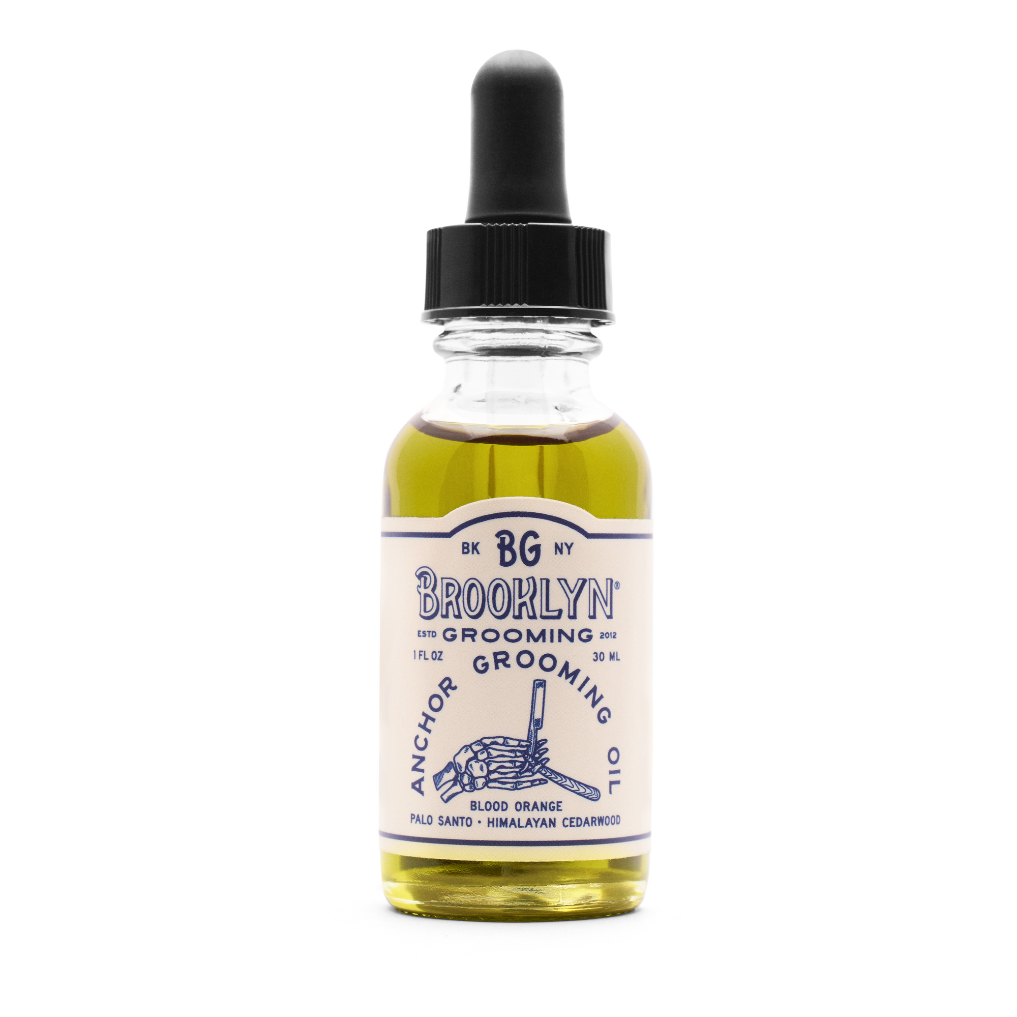 A bottle of Brooklyn Grooming Anchor Grooming Oil with a dropper cap.