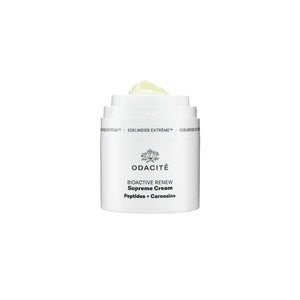 A white jar of Odacite Edelweiss Extreme Supreme Cream with a clear cap and label, containing a yellow-colored product.