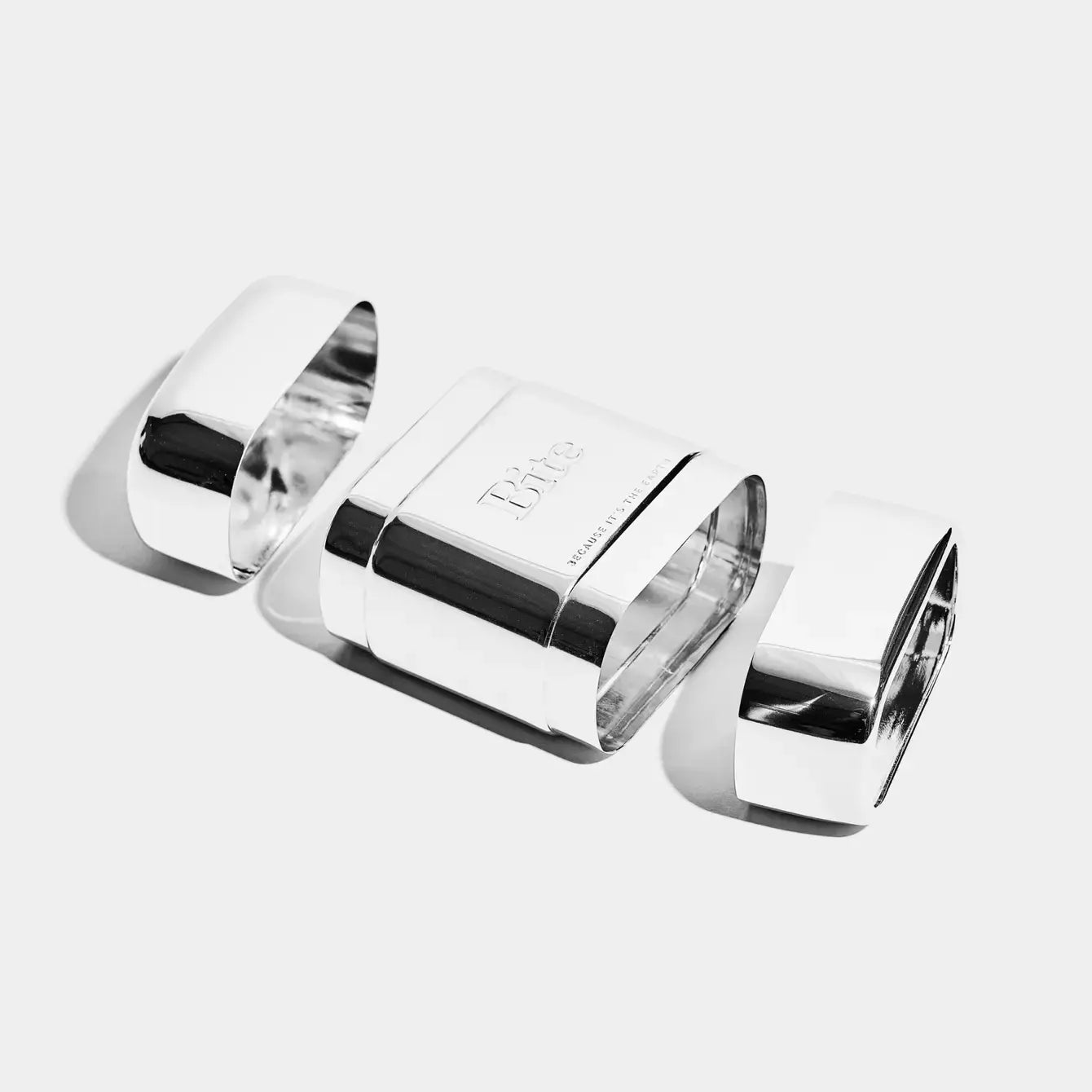 A silver bite deodorant case. 
