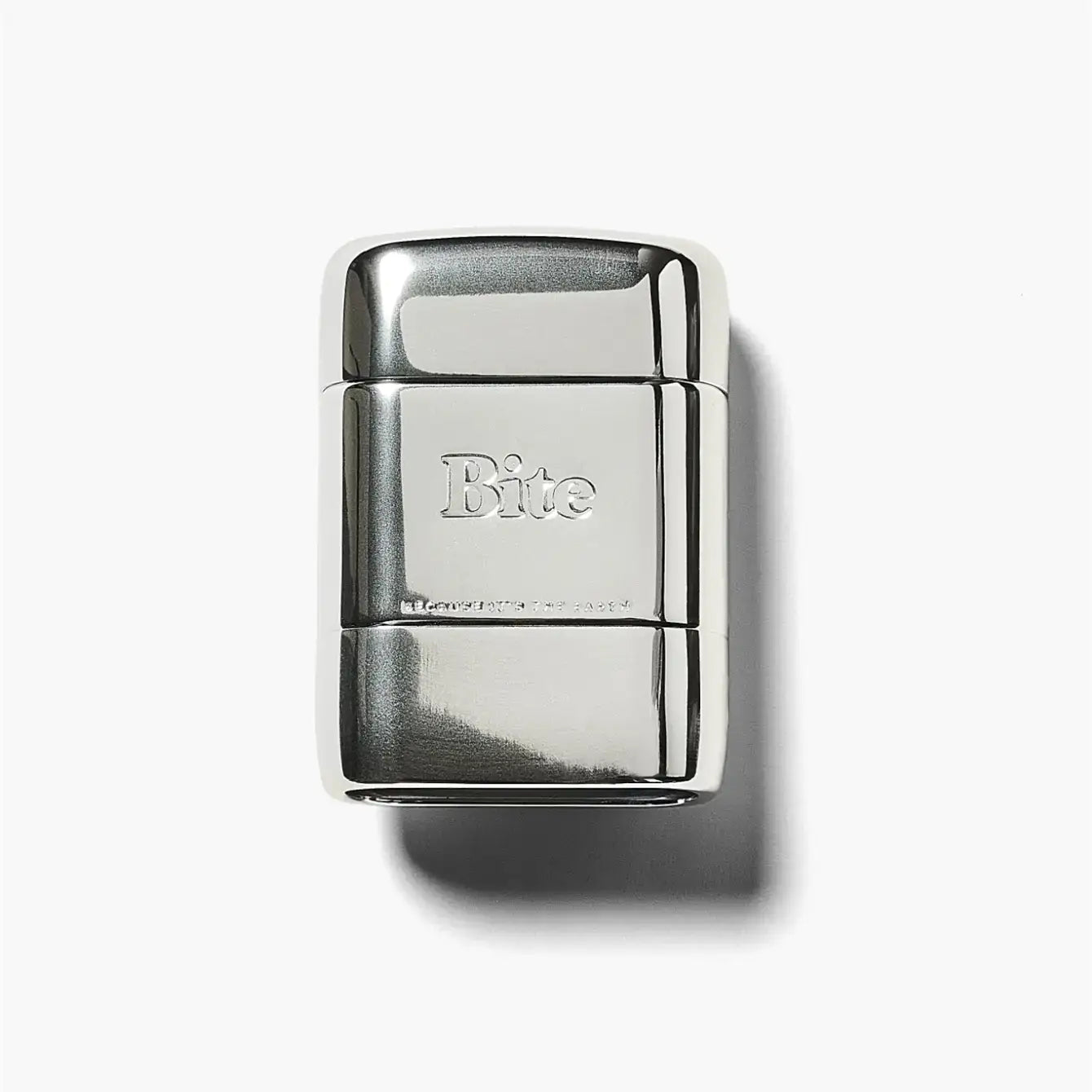 A silver Bite deodorant case. 