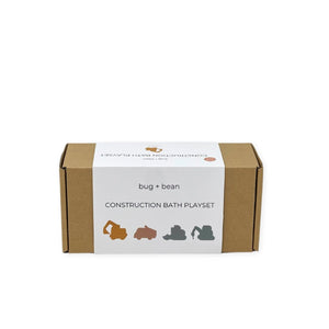 A brown box containing a Bug + Bean Construction Mold - Free Bath Set.
