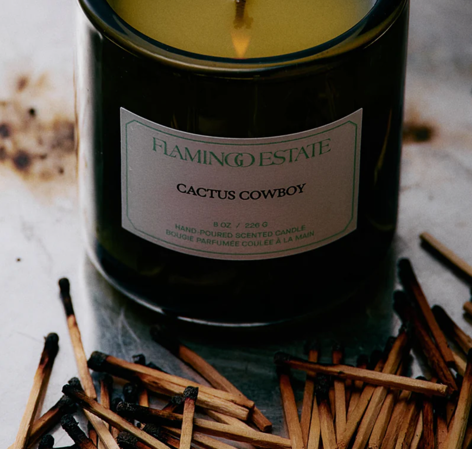 Candle with a label on a white background