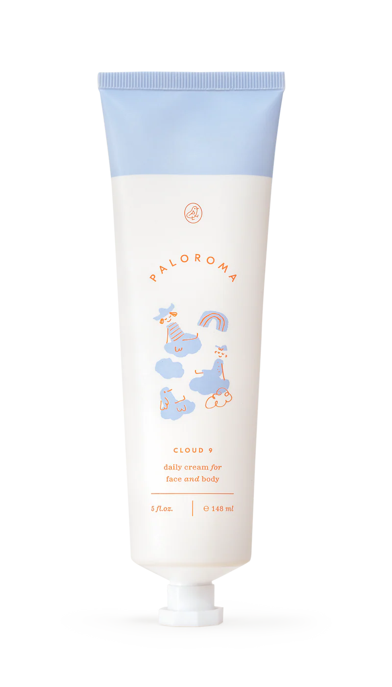 White tube with blue cap labeled 'Babymoov' on a white background