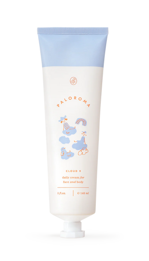 White tube with blue cap labeled 'Babymoov' on a white background