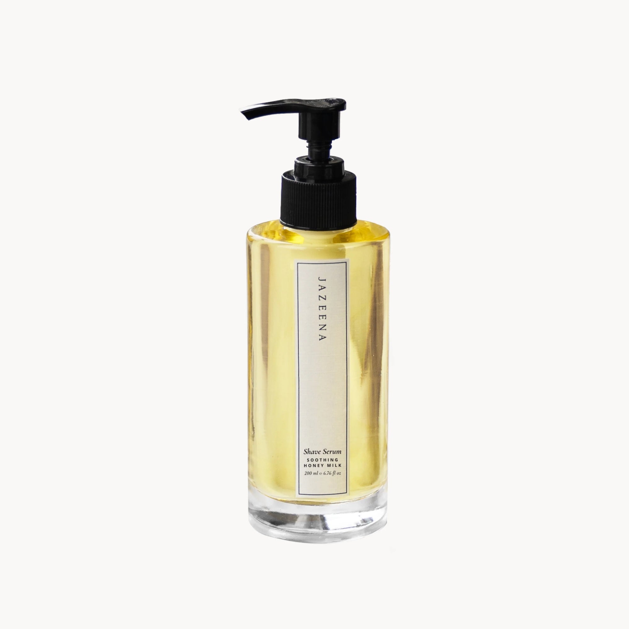 Bottle of Azeena Shave Serum with pump on a white background