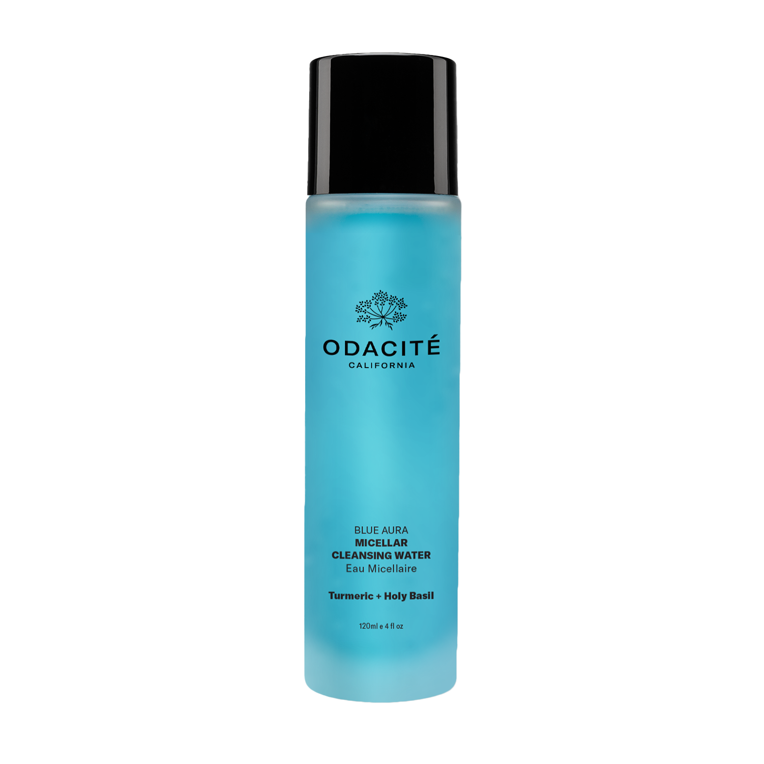 A blue bottle of Odacite Blue Aura Micellar Cleansing Water with white and black text, and a floral design near the cap.