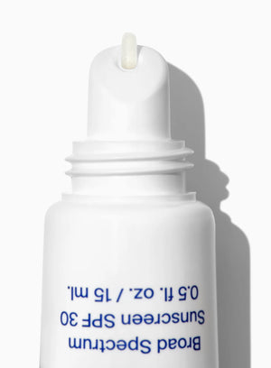 The applicator of a Supergoop mint balm