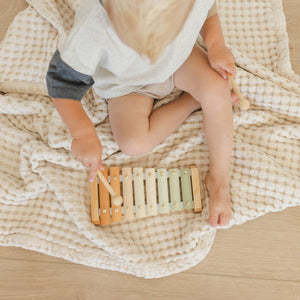 A child playing a musical instrument