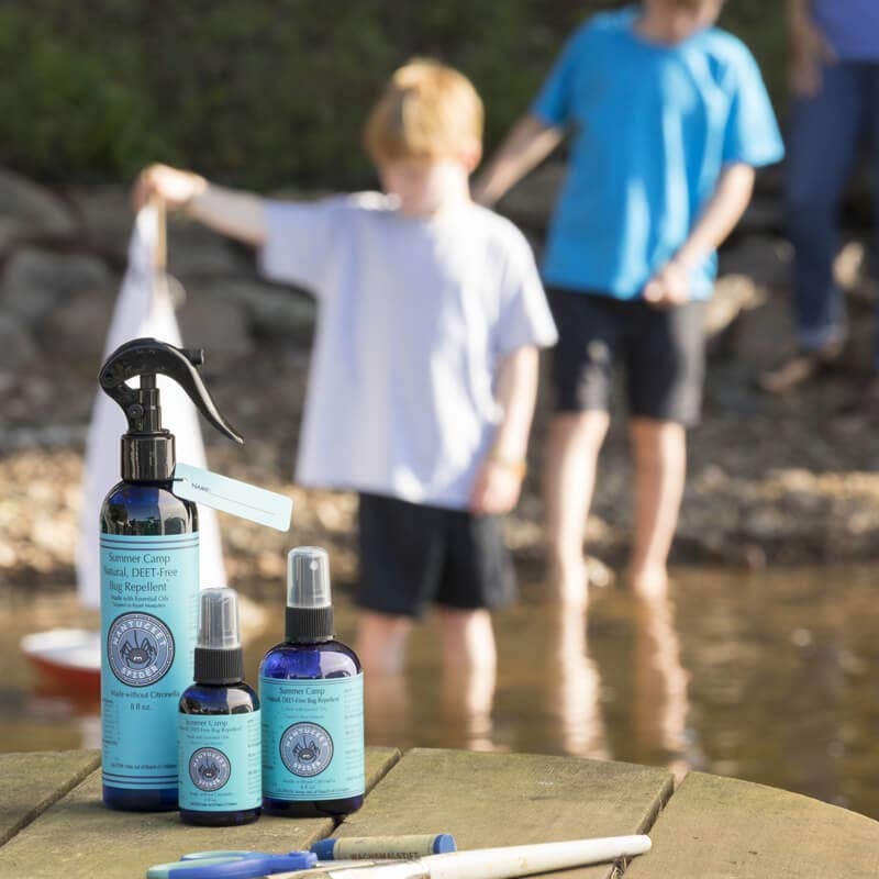 A bottle of Summer Camp Natural Bug Repellent Spray in different sizes, with the smallest two made from 100% post-consumer recycled plastic.