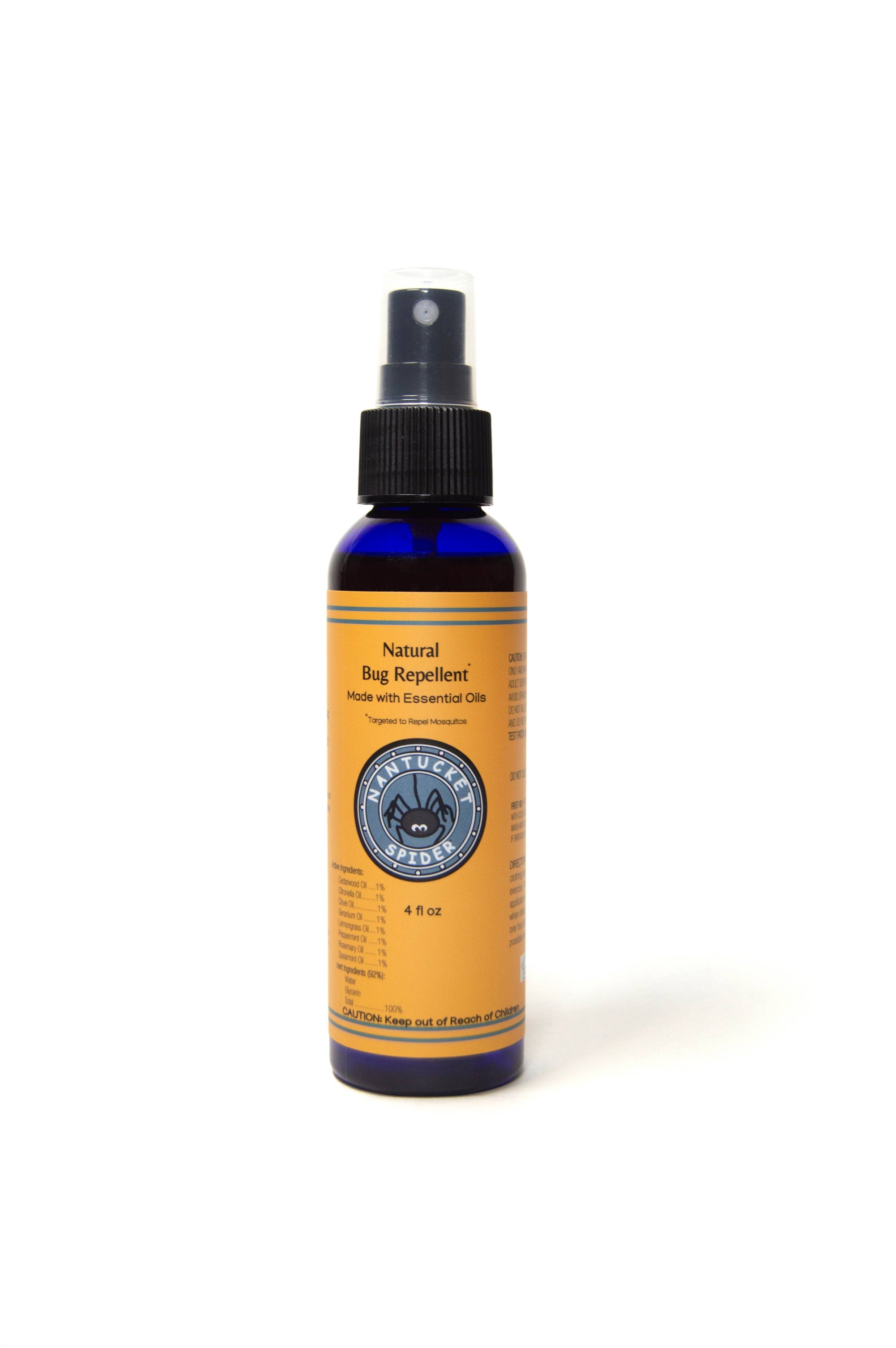 A bottle of nantucket spider bug repellent with an orange label