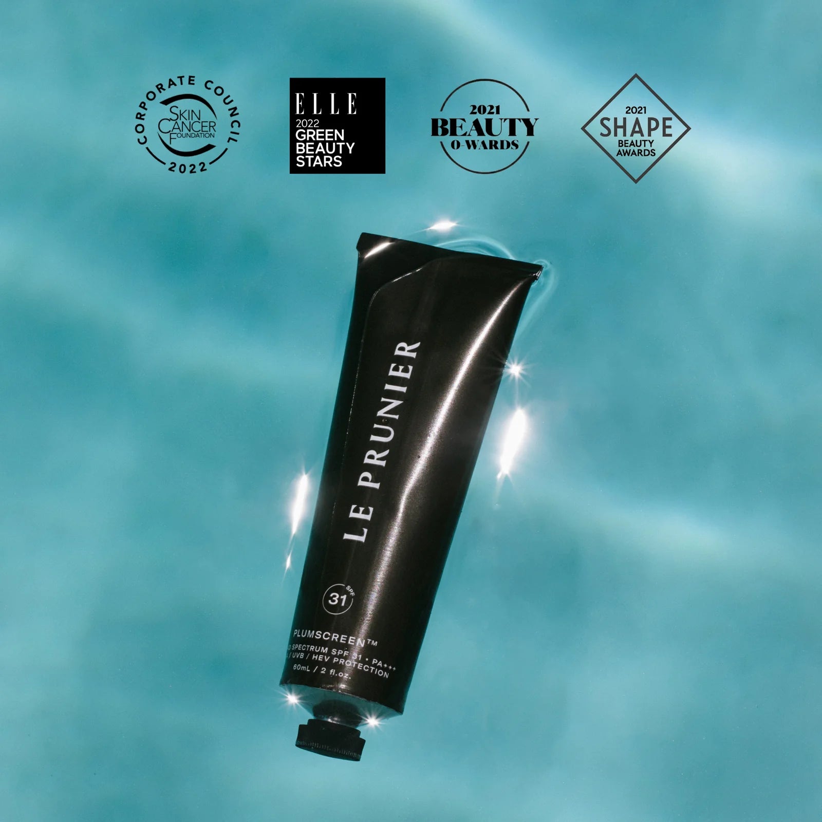 A black tube of Le Prunier Plumscreen broad spectrum SPF 31 sunscreen, with product details and branding visible.
