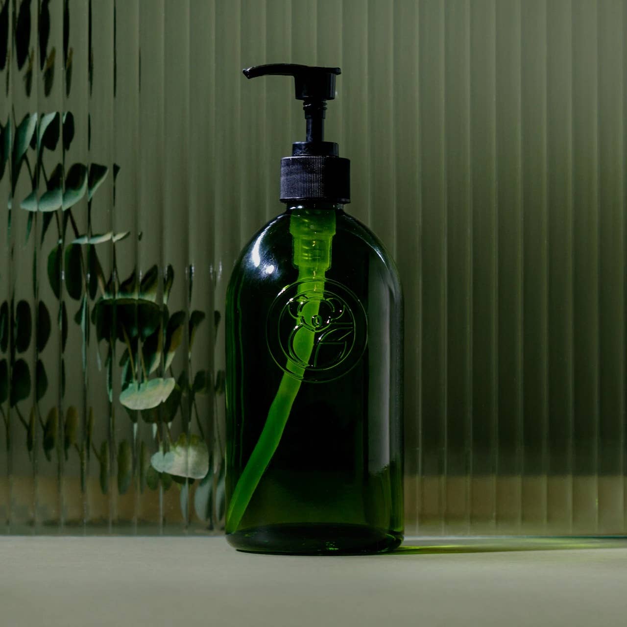 The koala eco green glass apothecary pump bottle