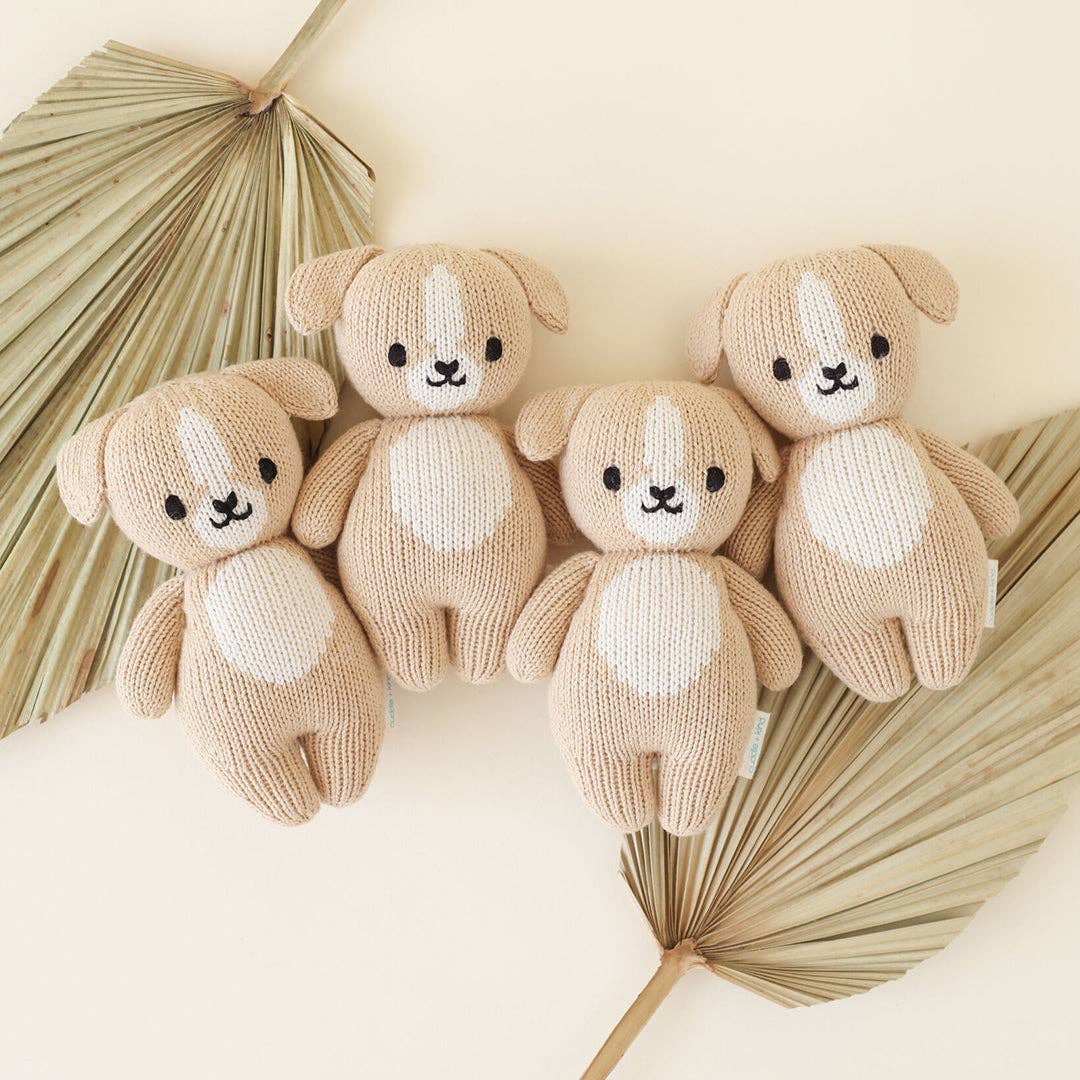A group of cuddle and kind baby puppy stuffed animals