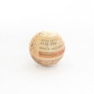A rose petal bath bomb, made by Soak