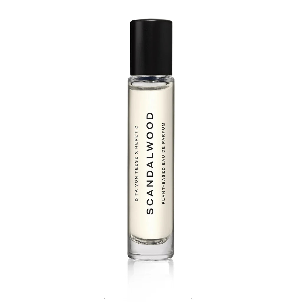 A bottle of Heretic Sandalwood perfume on a white background. 