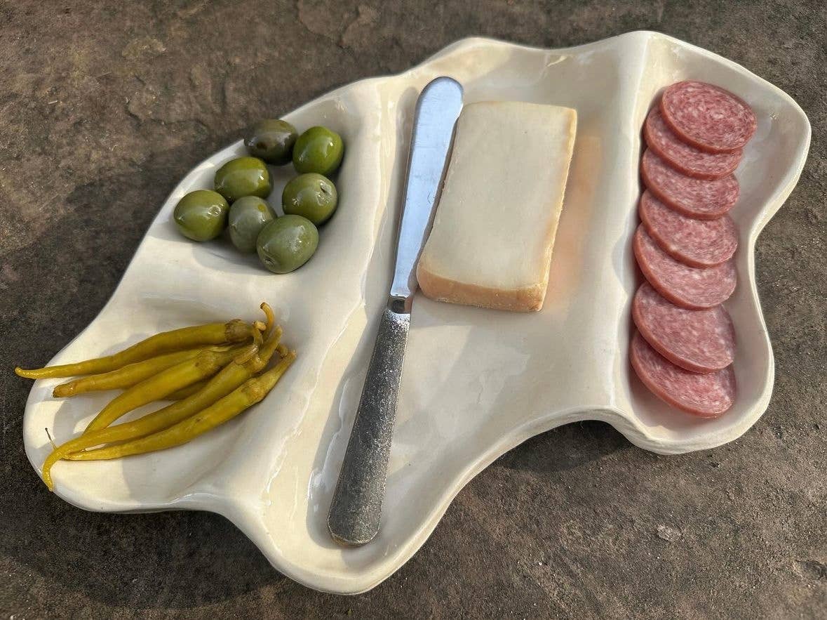 A unit 65 charcuterie board in ceramic. 