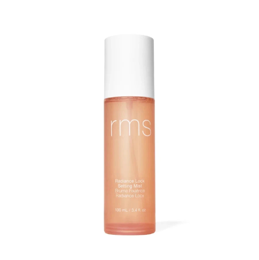 A clear glass bottle with a white pump, labeled 'rms', containing the Radiance Lock Setting Mist.