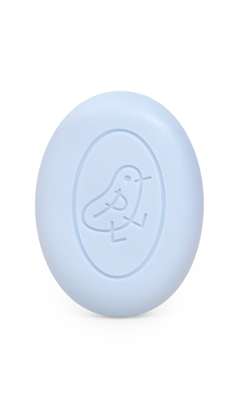 Light blue bar of soap with a logo on a white background