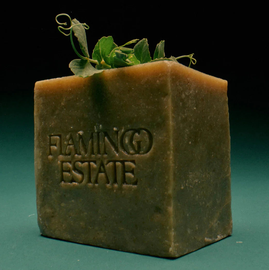Bar of soap with 'Flaming Estate' branding on a white background