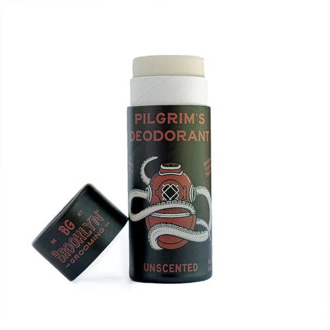 A stick deodorant labeled 'Pilgrim’s Deodorant' with the word 'UNSCENTED' printed on the cap, indicating the fragrance-free variant of the product.