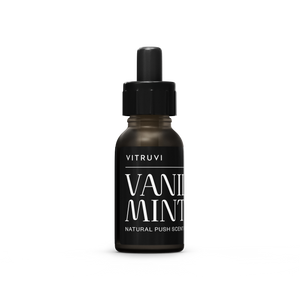 Vitruvi Vanilla Mint essential oil bottle on a white background