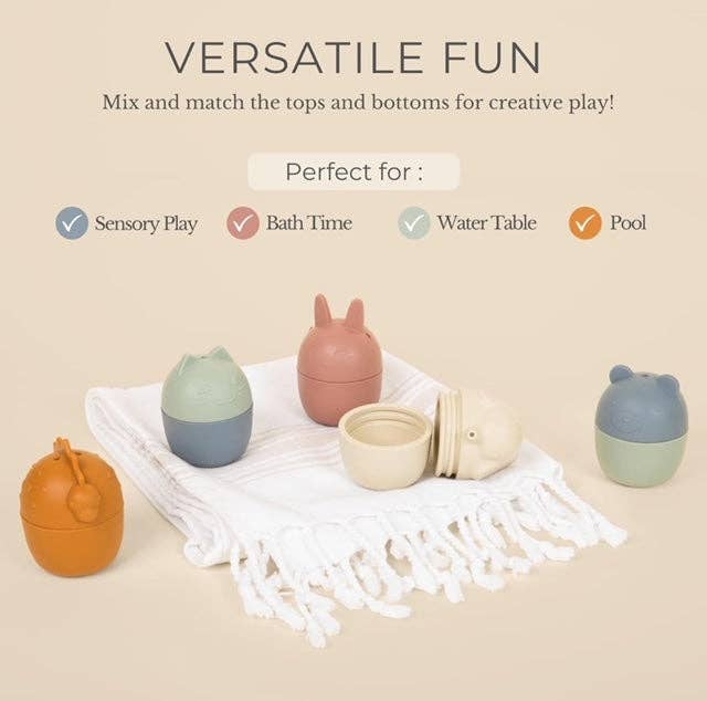 A set of colorful bath toys designed to look like various animals, displayed on a cardboard box with the brand 'Brooklyn Neutral' visible.